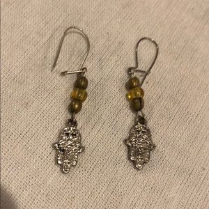 Hamsa earrings with beads.